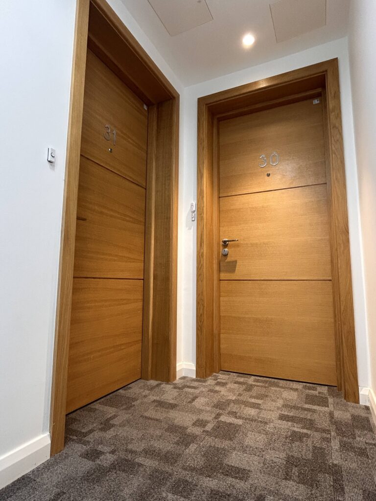 Vanguard engineer inspecting a fire door
